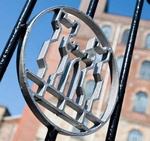 The ironwork roundel on the mill gates